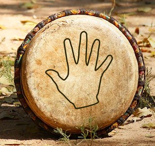 Djembe size - hand on drum