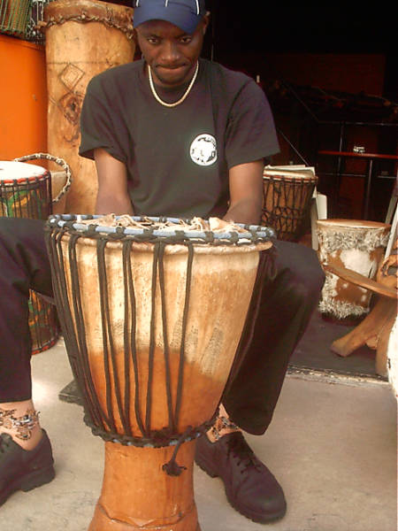 My djembe repair teacher Papy working his magic on a drum