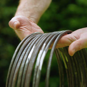 Metal djembe rings and hardware components for drum construction