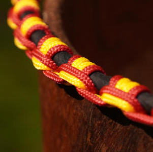 Colourful djembe rope coiled showing vibrant red and yellow options